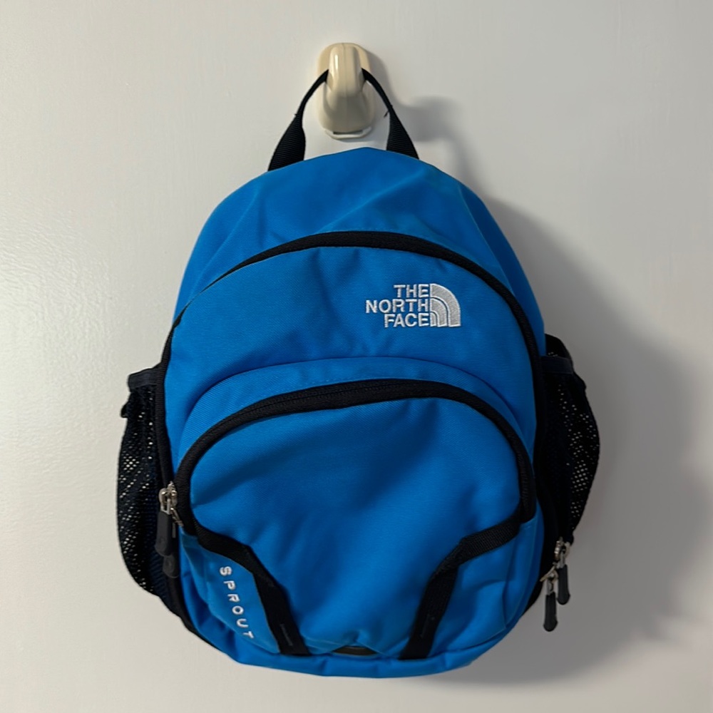 Small blue North Face backpack for young kids